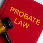 Image illustrating how to avoid probate in California with probate law book and gavel.