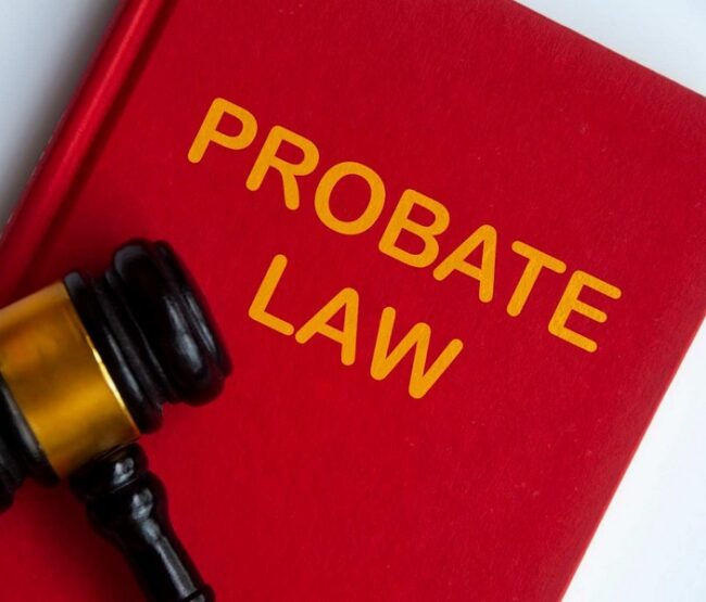 Image illustrating how to avoid probate in California with probate law book and gavel.