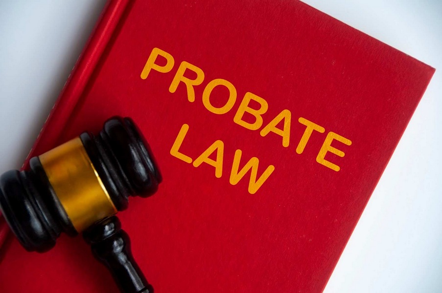 Image illustrating how to avoid probate in California with probate law book and gavel.