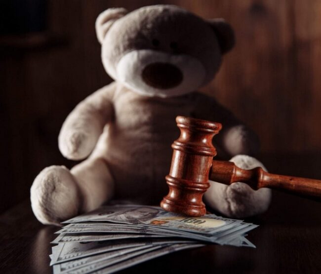 Visual representation of when child support ends in California with gavel and money.